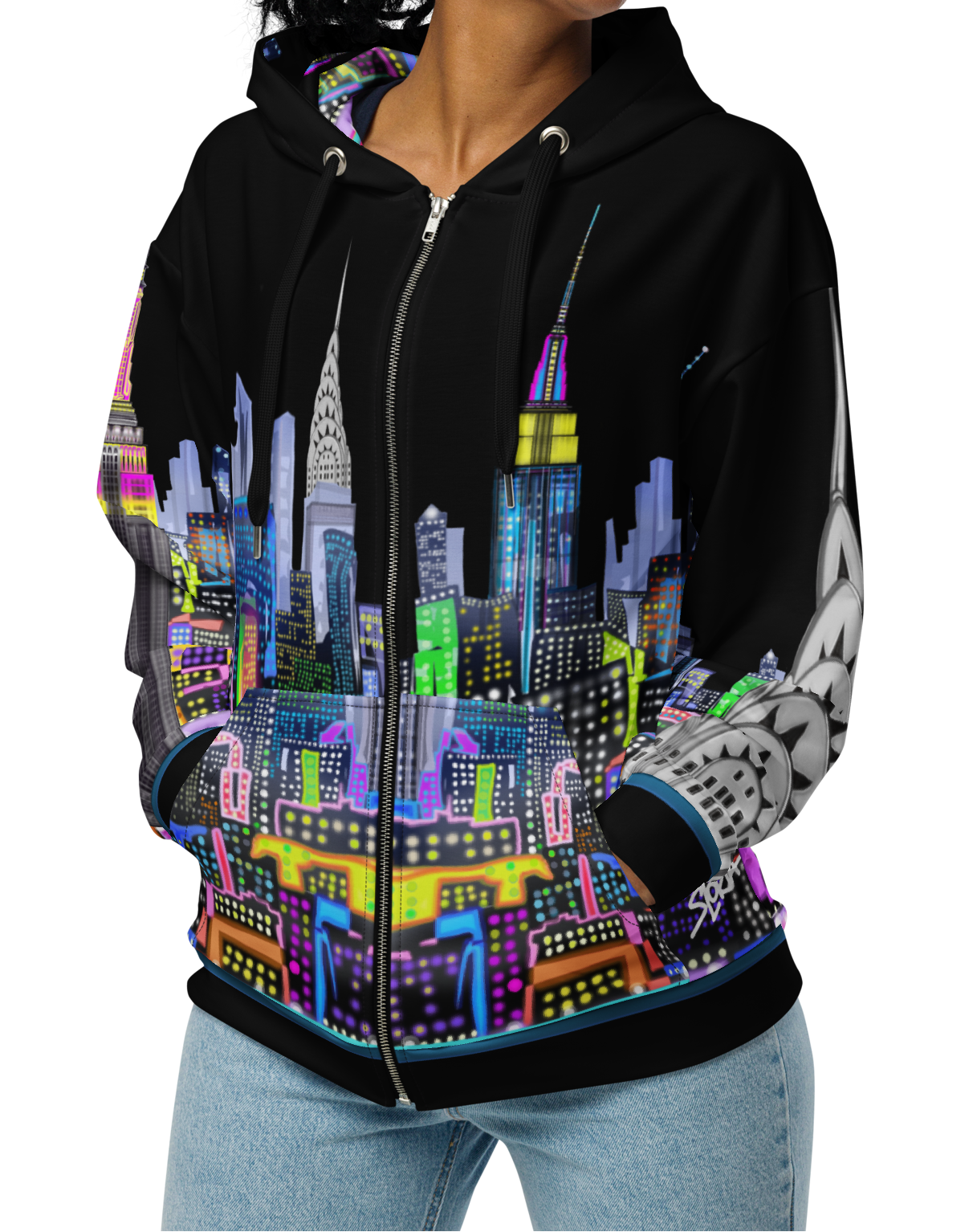 Person wearing a Loria NYC Art black hoodie with a colorful cityscape design on a white background