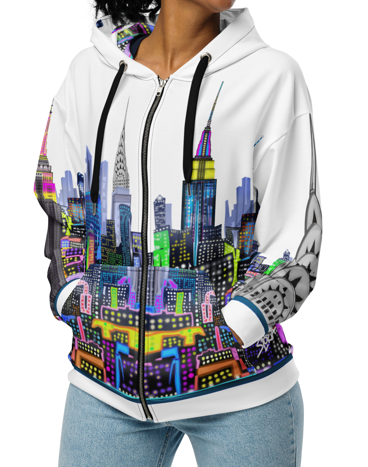 Person wearing a white hoodie with a colorful Loria NYC Art cityscape design on a white background