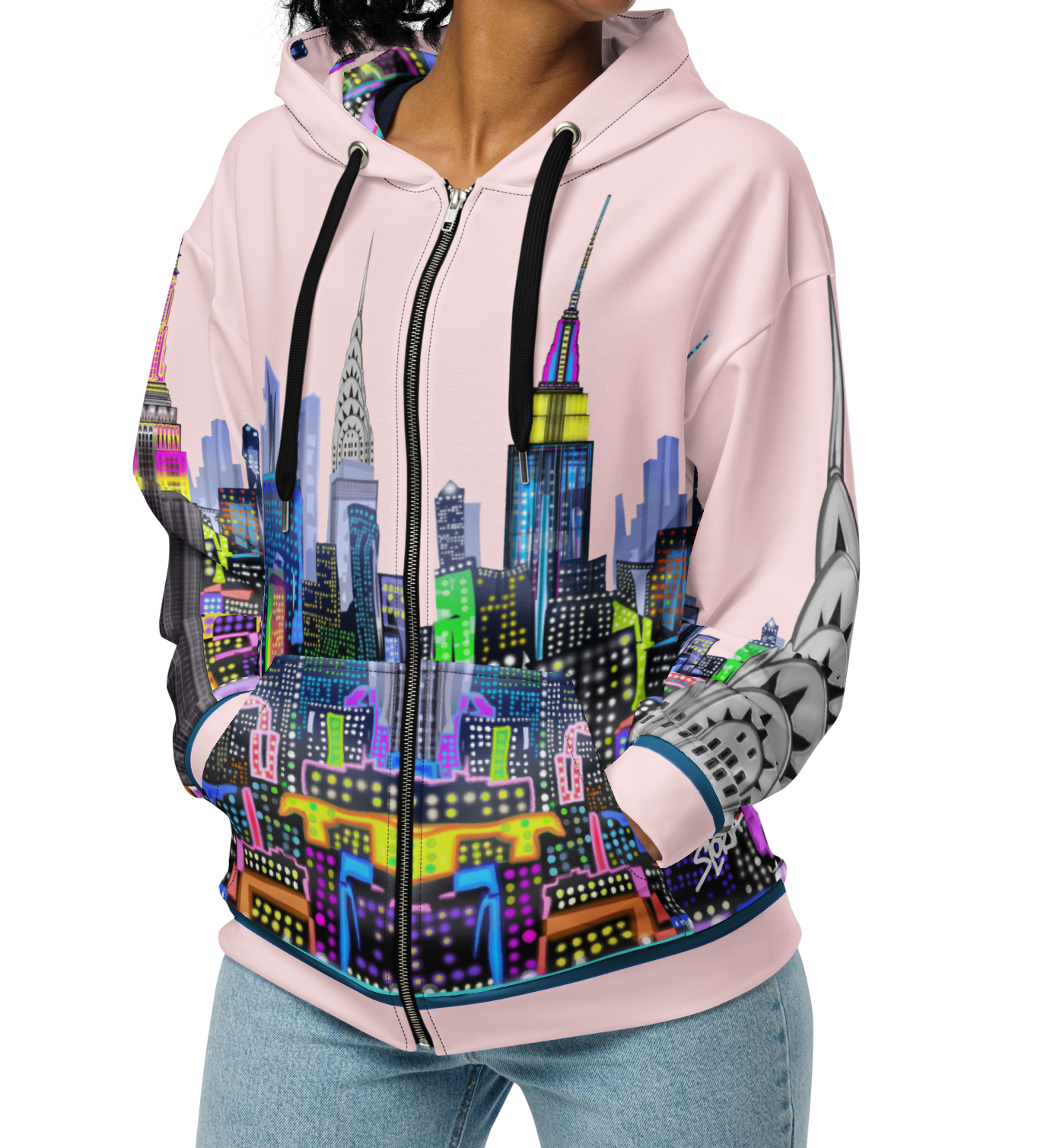 Person wearing a pink hoodie with a colorful cityscape Loria NYC Art design on a white background