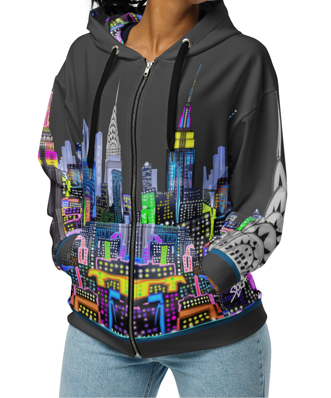 Woman wearing a hoodie with a colorful cityscape Loria NYC Art design on a white background