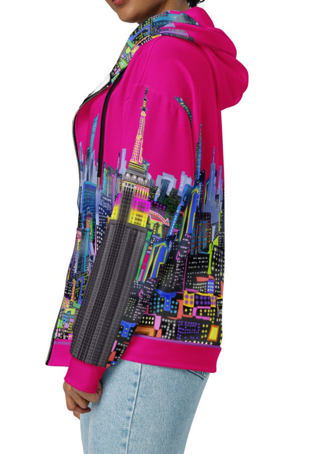 Side of Person wearing a colorful hoodie with Loria NYC Art cityscape design on a white background