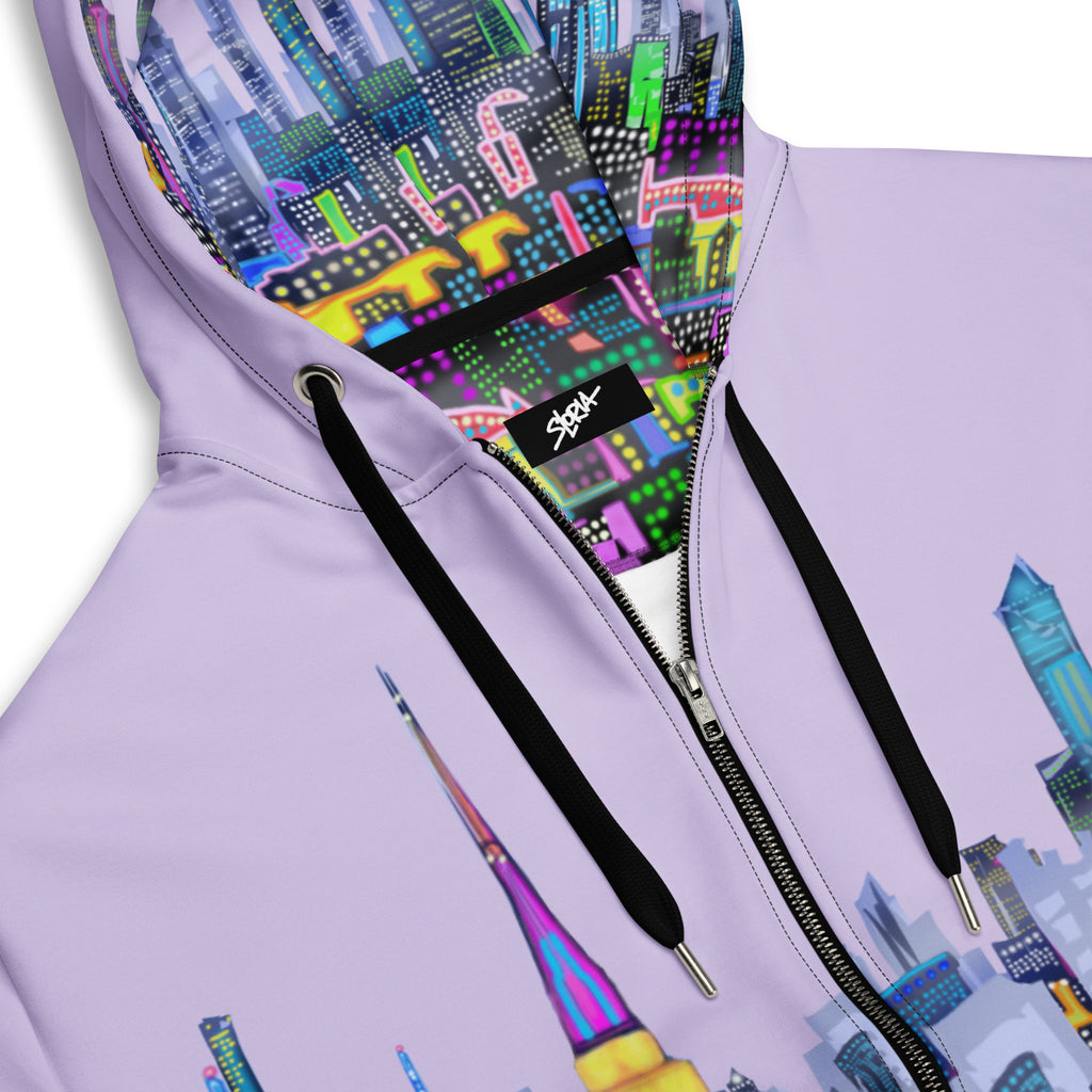 Light purple hoodie with a  Loria NYC Art colorful cityscape design on the hood and back, featuring a brand logo.
