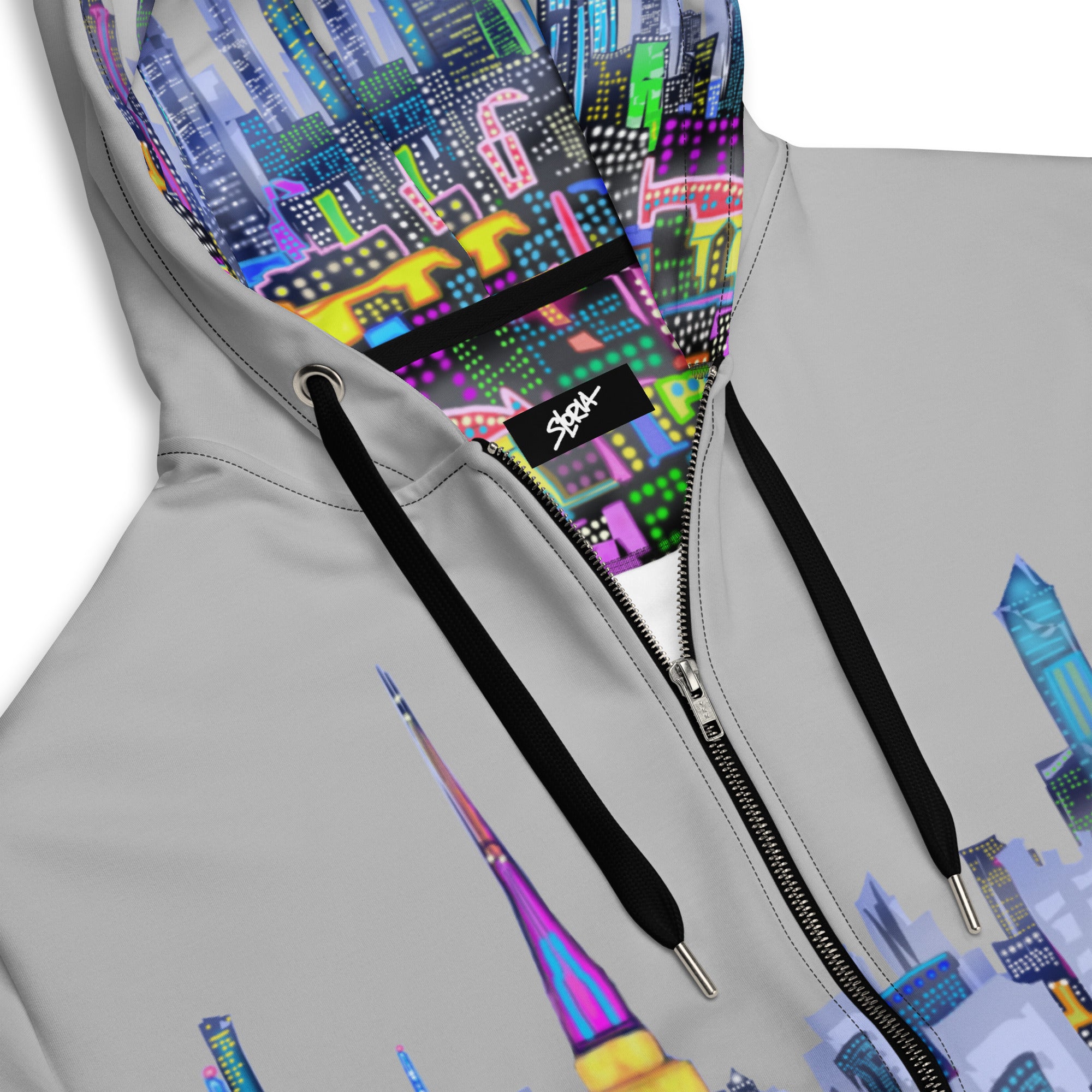 Gray hoodie with colorful Loria NYC Art cityscape design on the hood and front pocket, featuring a brand logo.