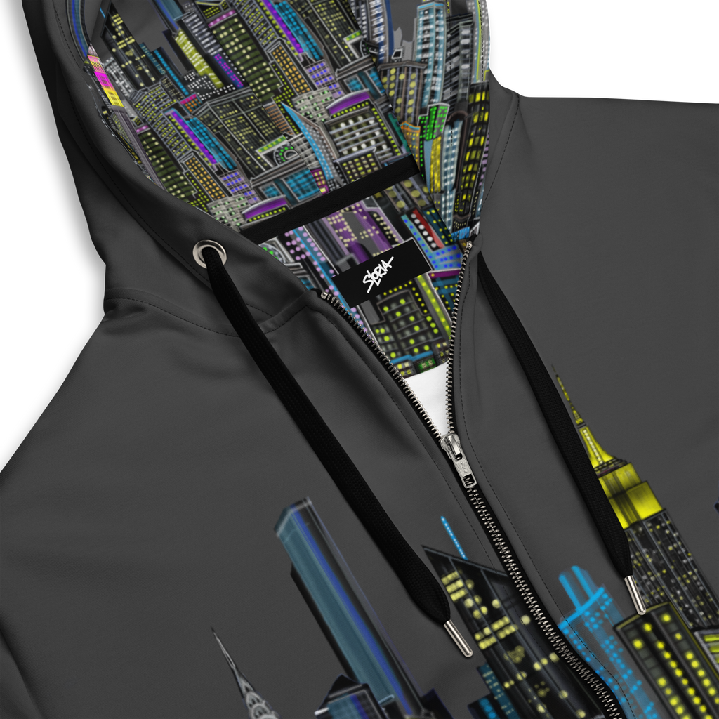 Black jacket with colorful Loria NYC Art cityscape design on hood and zipper area, featuring a brand logo.