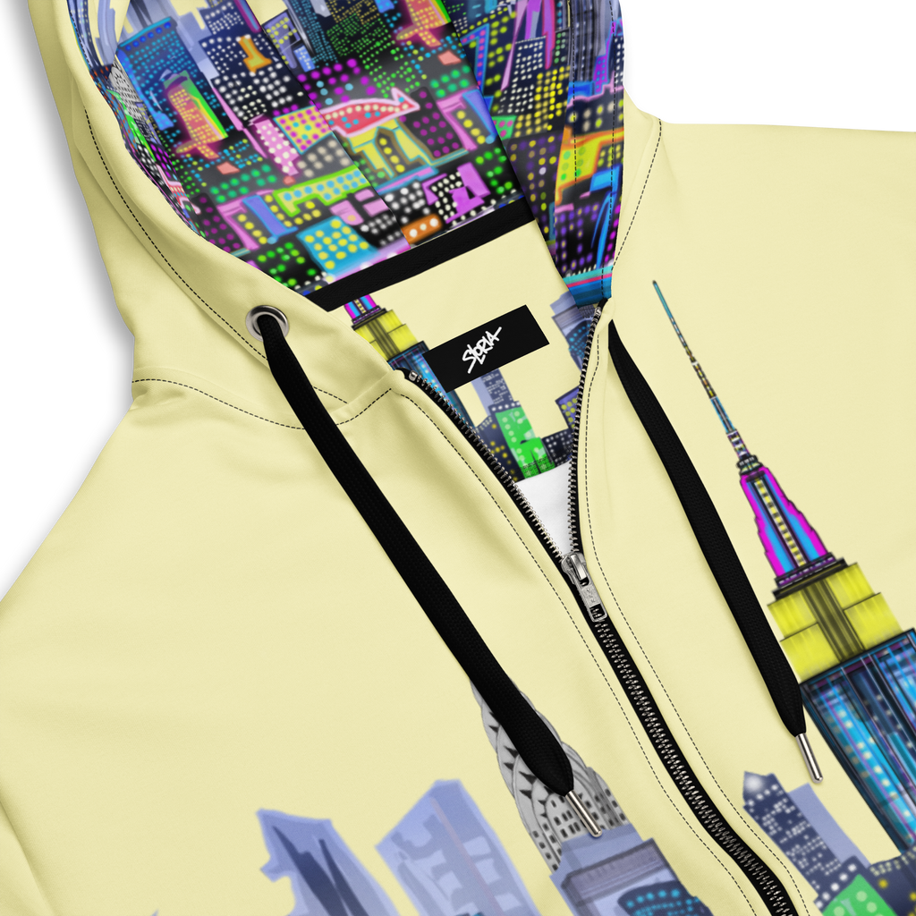 Hoodie with colorful Loria NYC Art cityscape design on a light yellow background