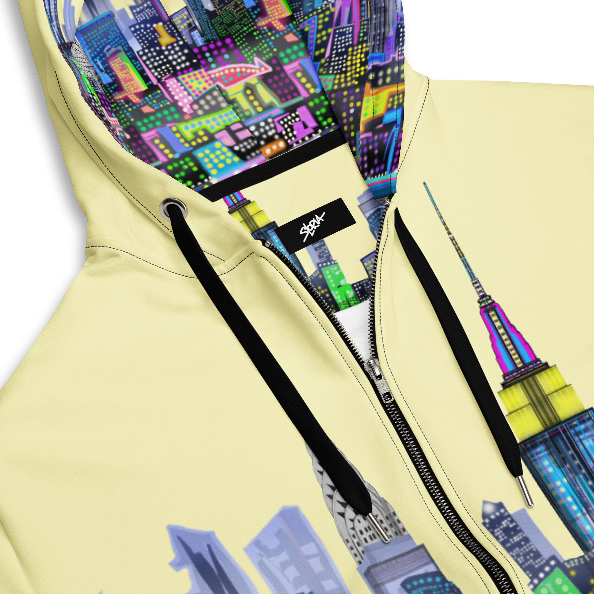 Hoodie with colorful Loria NYC Art cityscape design on a light yellow background