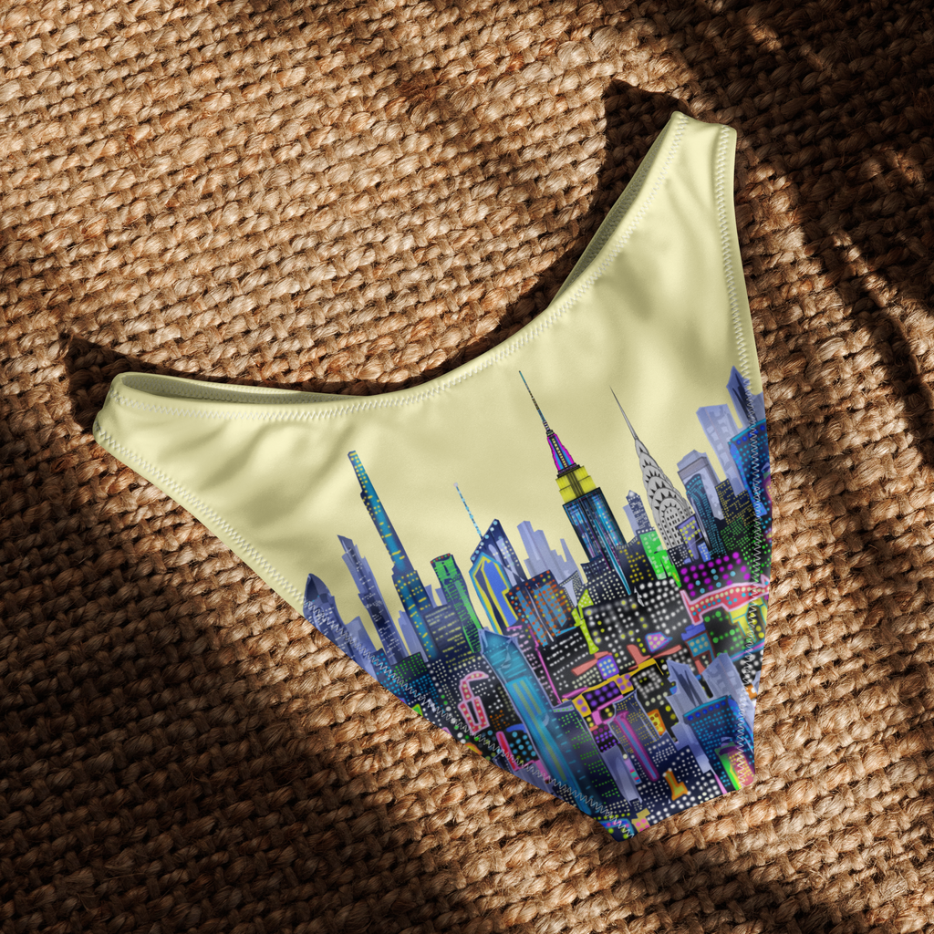 Bikini bottom with Loria NYC Art cityscape design on a textured surface