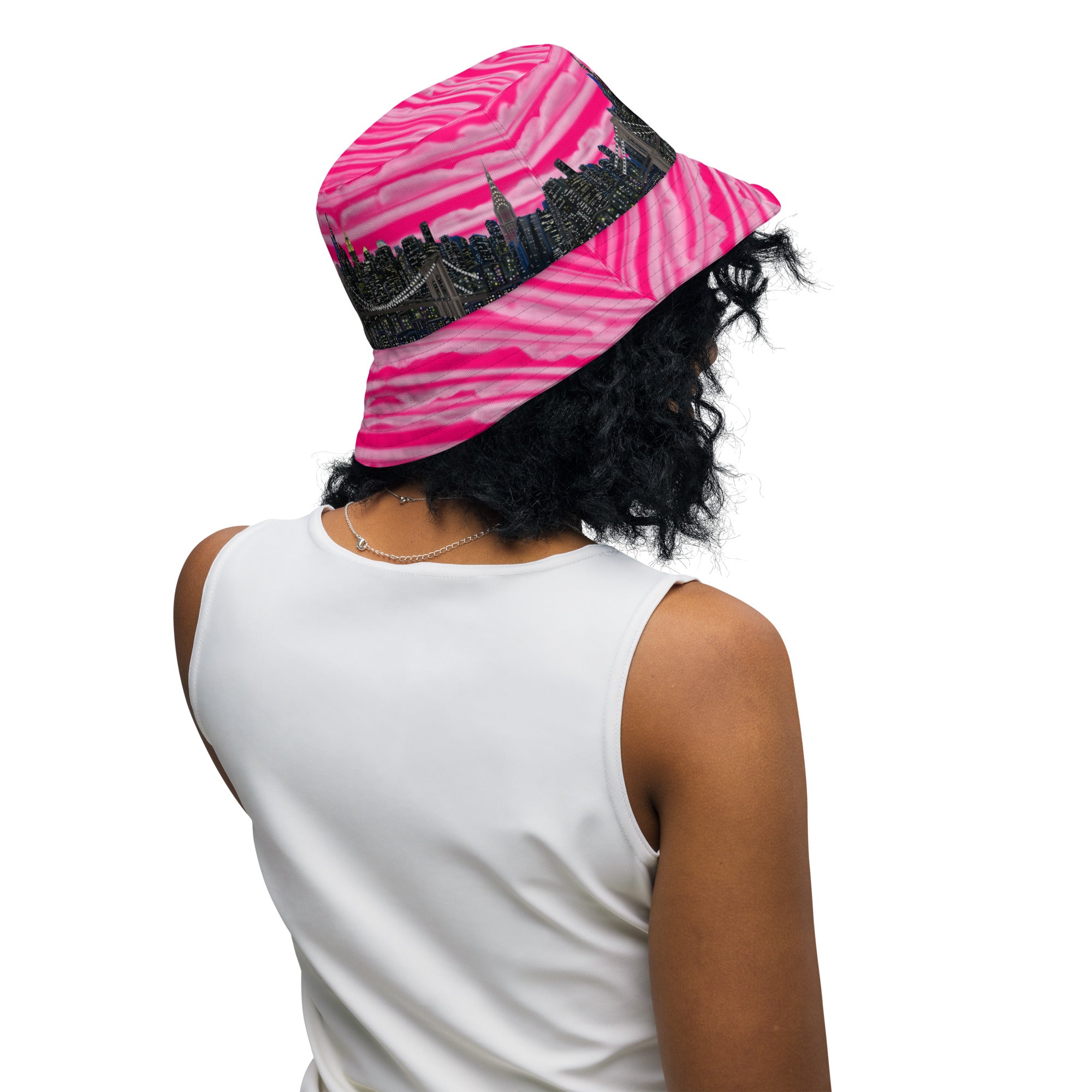 Women wearing  Reversible Bucket Hat with Città Rosa Vento Fuchsia NYC skyline designed with Brooklyn bridge by S.Loria NYC