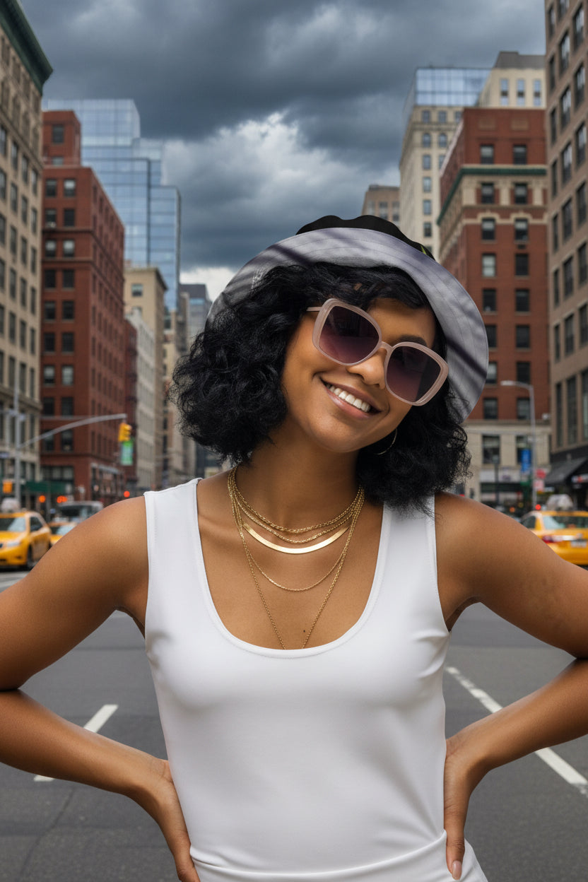Women posing in  Reversible Bucket Hat with NYC Skyline designed by S. Loria NYC Art