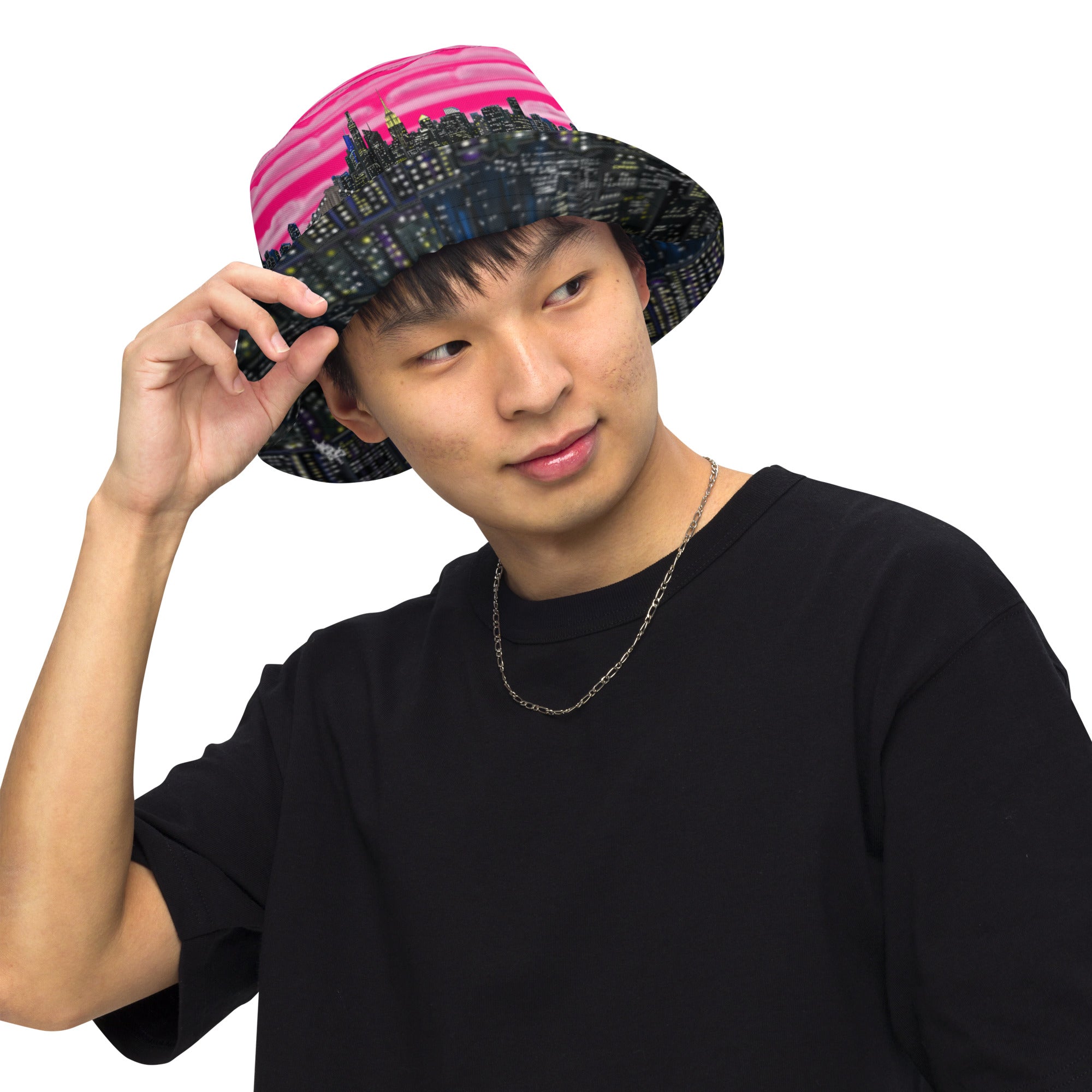 Man wearing  Reversible Bucket Hat with Città Rosa Vento Fuchsia NYC skyline designed with Brooklyn bridge by S.Loria NYC