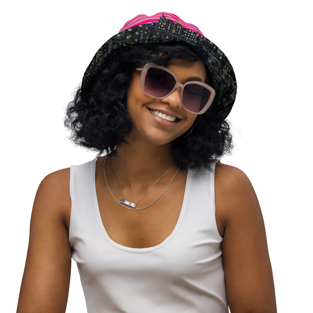 Women wearing  Reversible Bucket Hat with Città Rosa Vento Fuchsia NYC skyline designed with Brooklyn bridge by S.Loria NYC