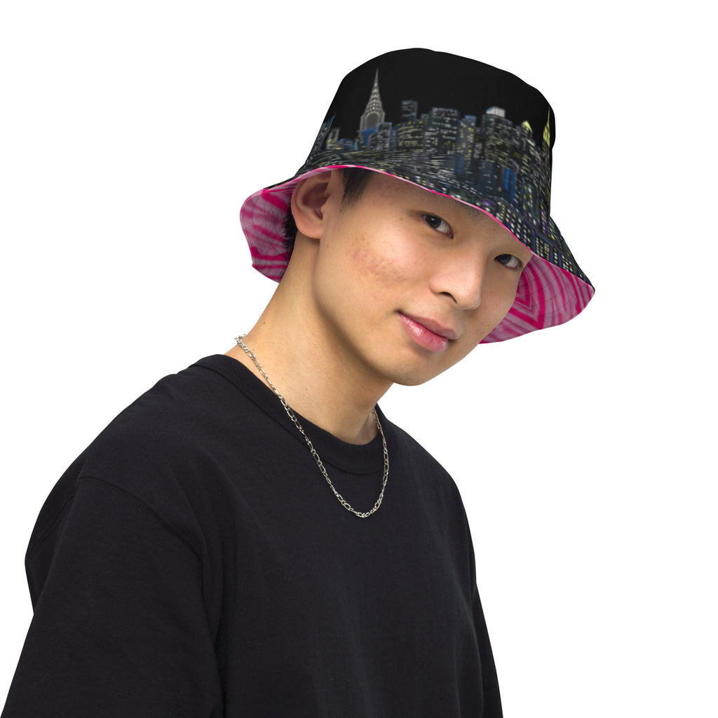 Man wearing  Reversible Bucket Hat with Città Rosa Vento Fuchsia NYC skyline designed with Brooklyn bridge by S.Loria NYC