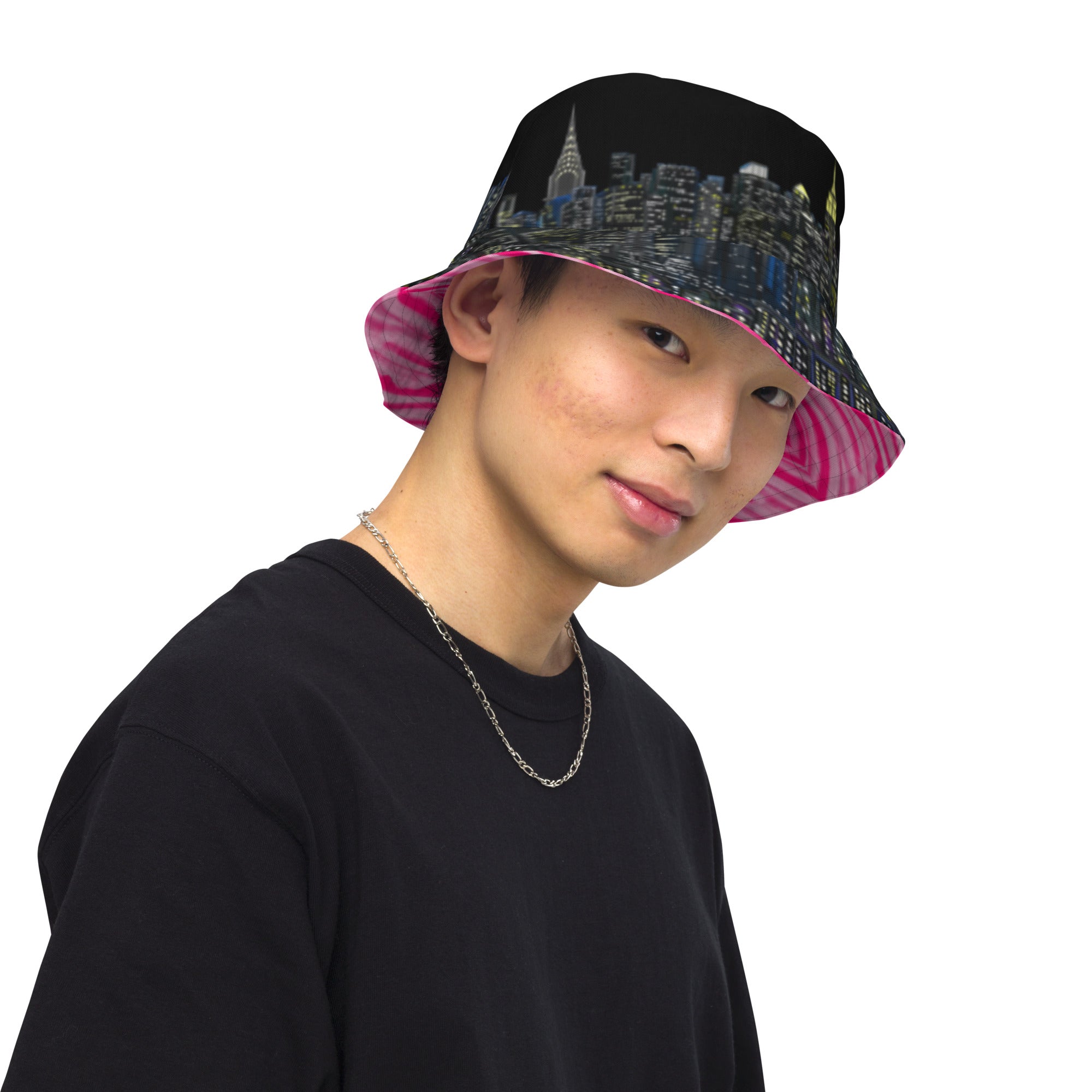 Man wearing  Reversible Bucket Hat with Città Rosa Vento Fuchsia NYC skyline designed with Brooklyn bridge by S.Loria NYC