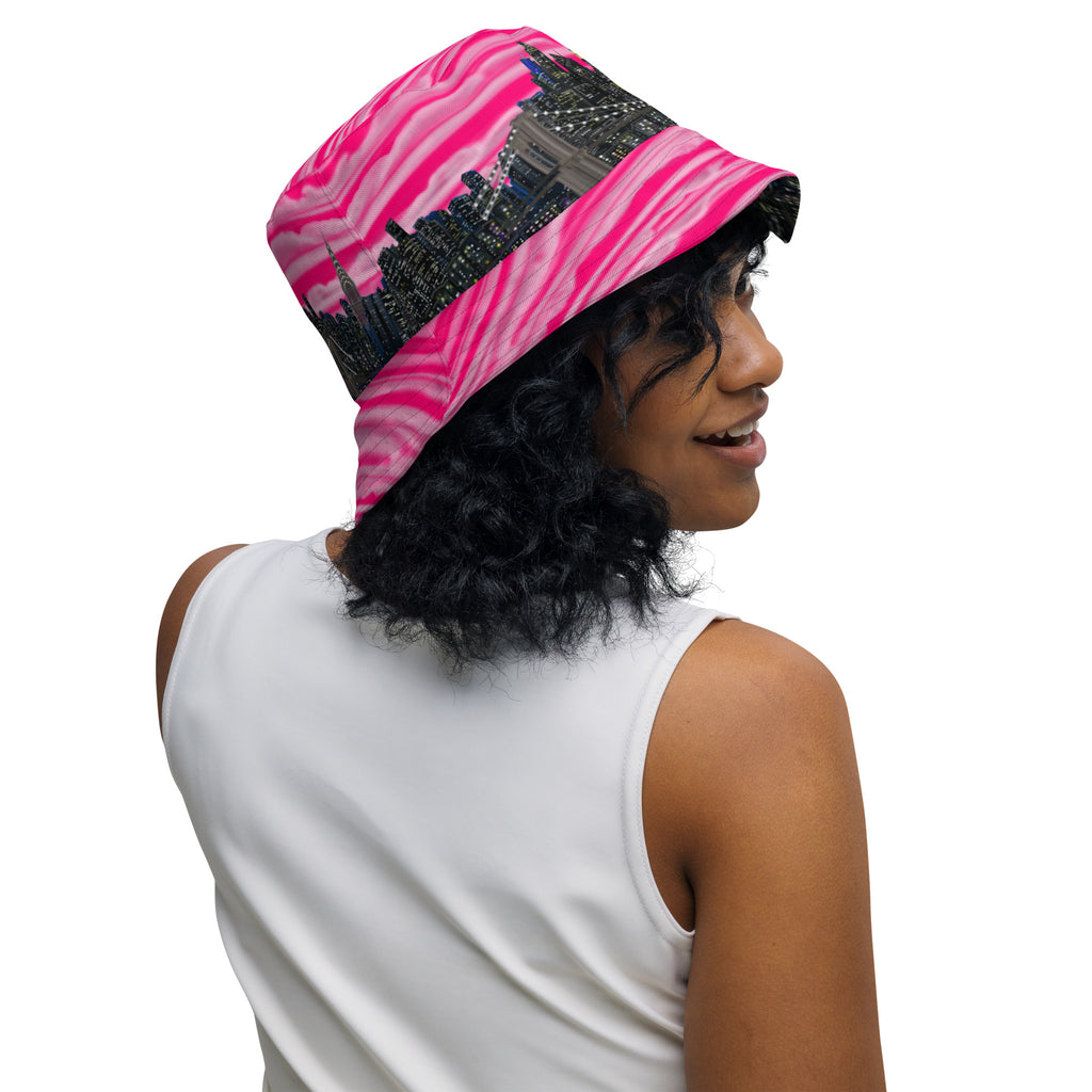 Women wearing  Reversible Bucket Hat with Città Rosa Vento Fuchsia NYC skyline designed with Brooklyn bridge by S.Loria NYC