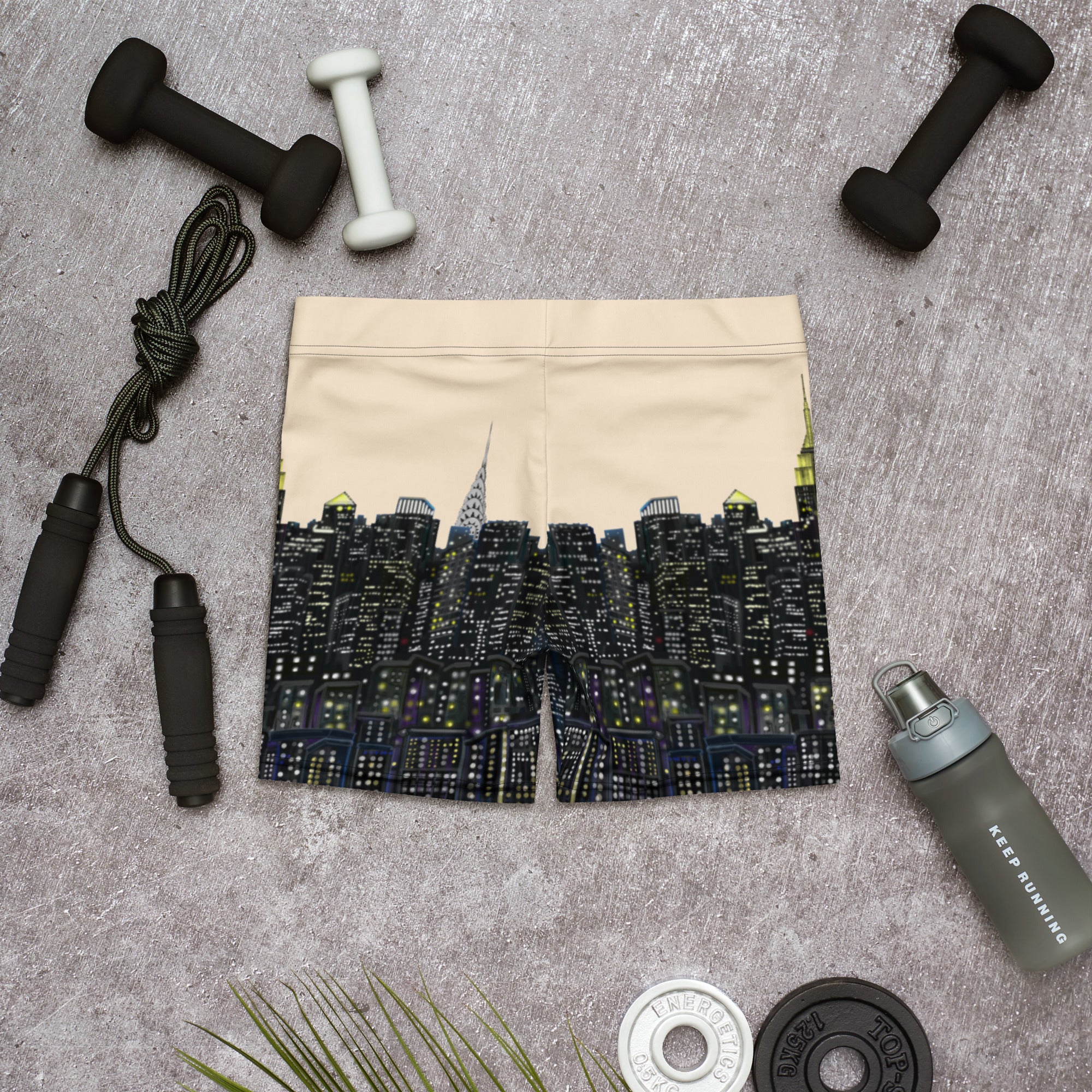 S.Loria NYC Art shorts with fitness equipment on a gray surface