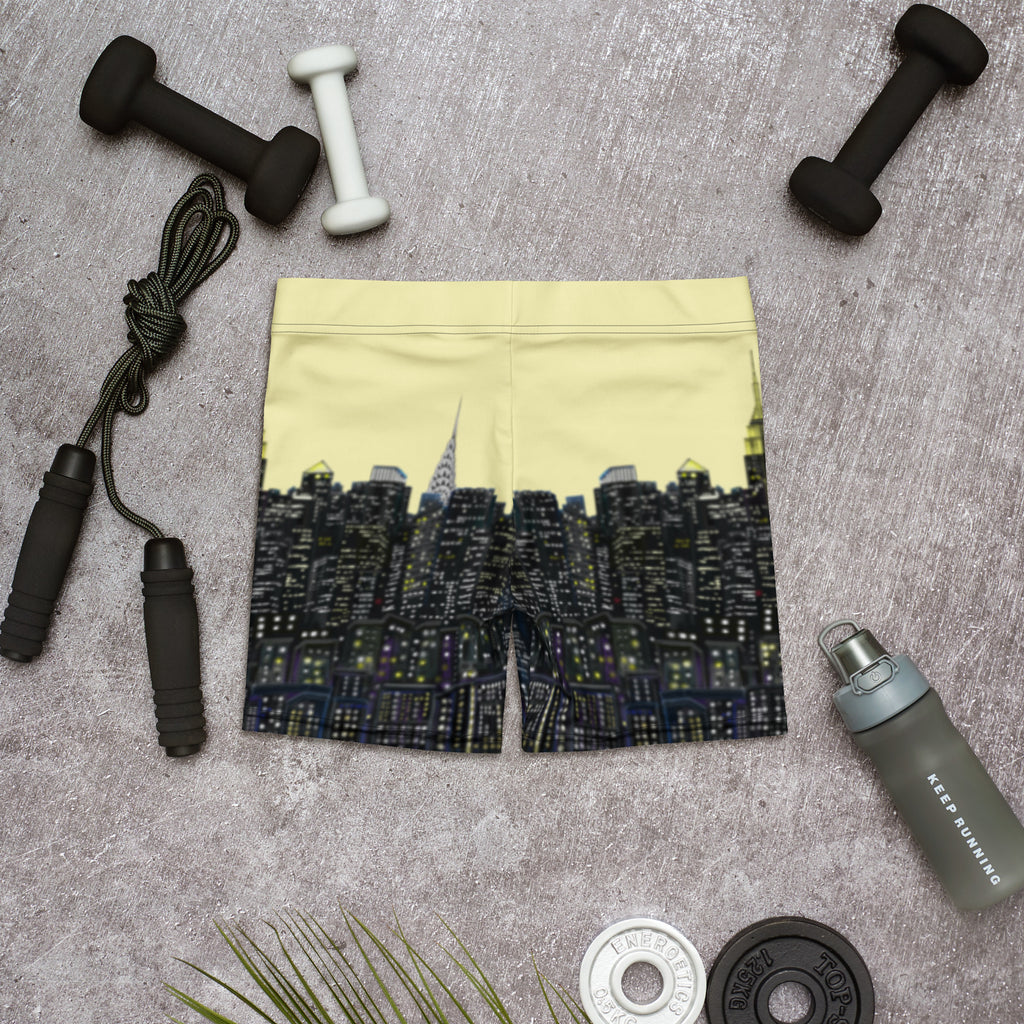 Cityscape shorts with fitness equipment on a gray surface