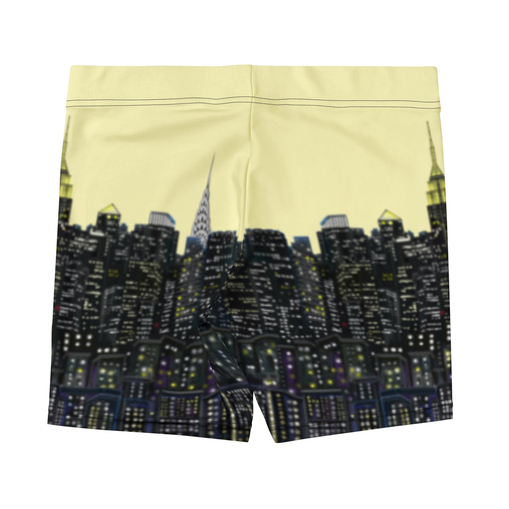 Shorts with a Loria NYC Art skyline design on a light yellow background