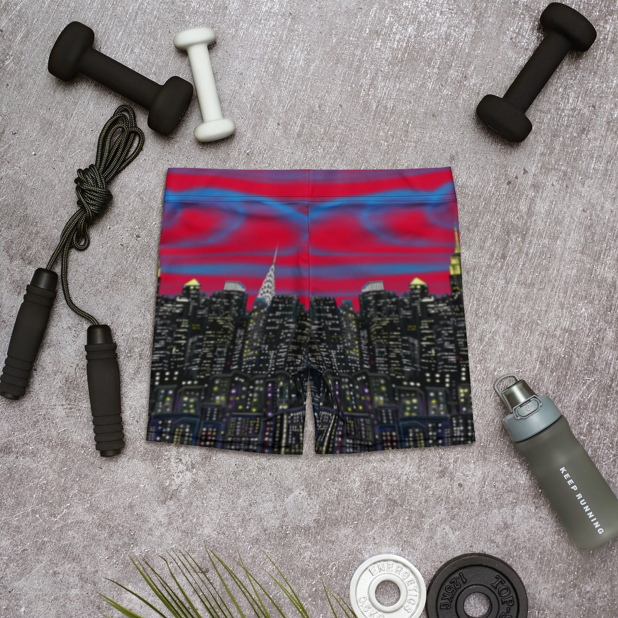 Cityscape Loria NYC Art shorts with fitness equipment on a gray surface