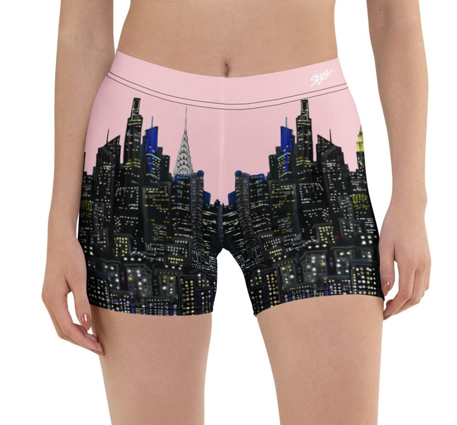 Cityscape Loria NYC Art shorts with a pink waistband on a white background