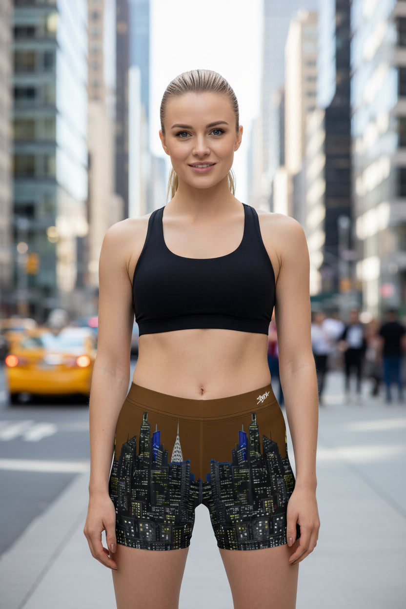 Person wearing shorts with a Loria NYC Art cityscape design on a urban background