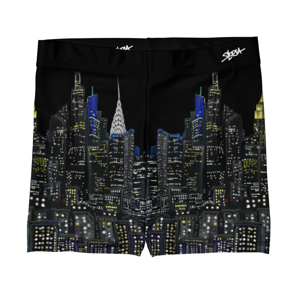 Black swim briefs with a cityscape design on a white background