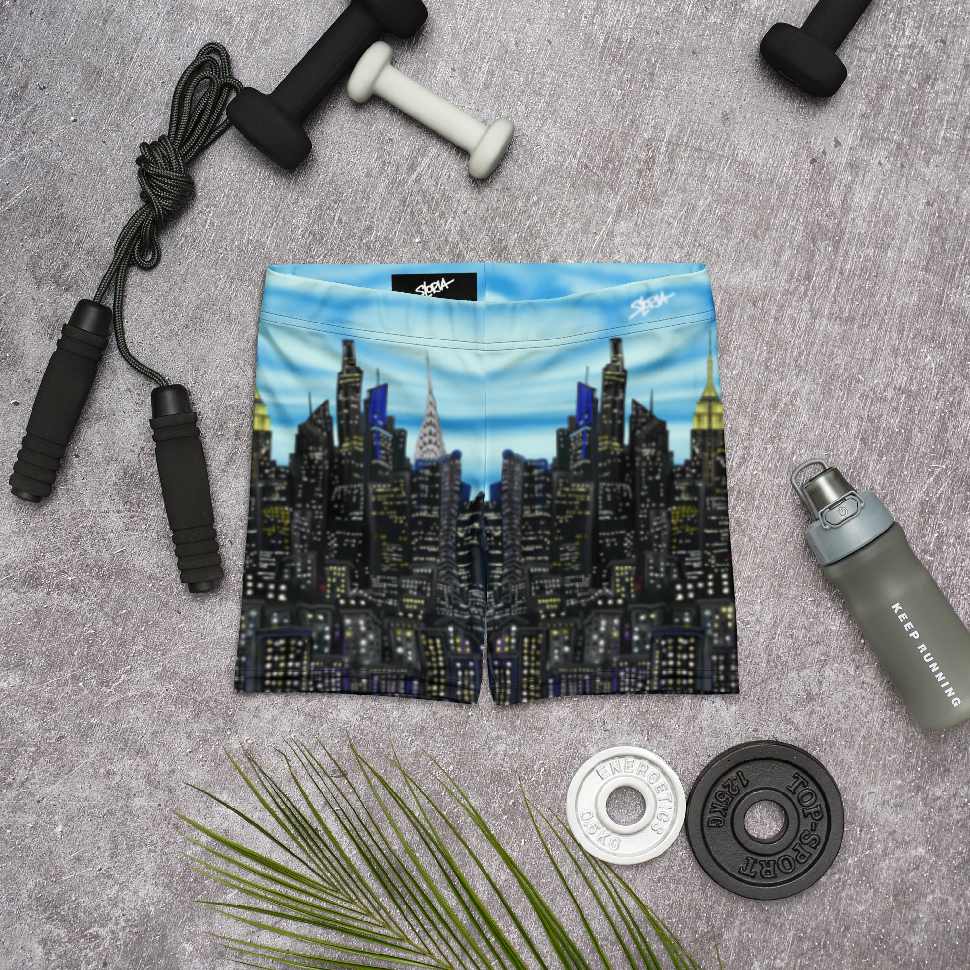 Cityscape Loria NYC Art shorts with fitness equipment on a gray surface