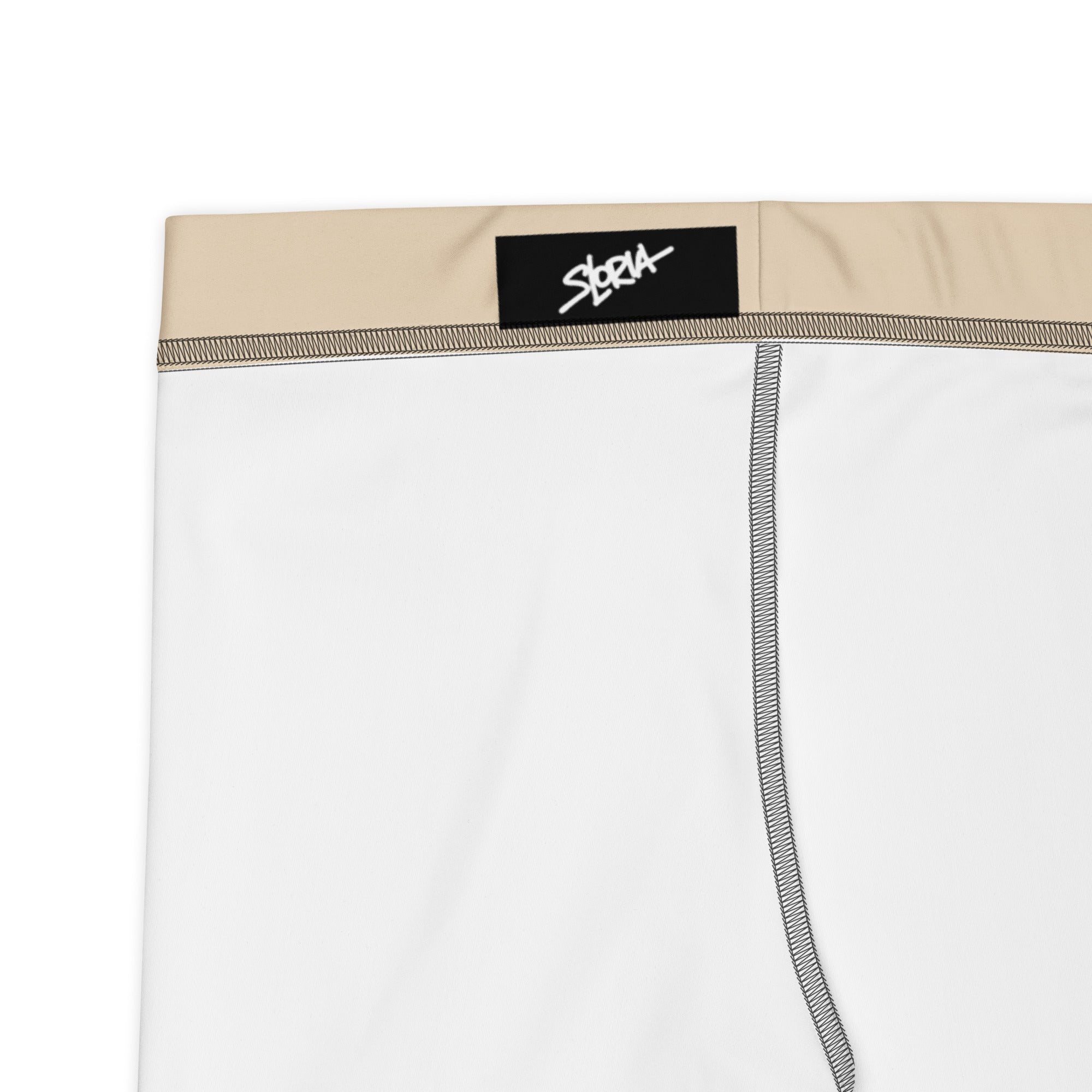 White boxer briefs with beige waistband and Loria NYC Art brand label on a white background