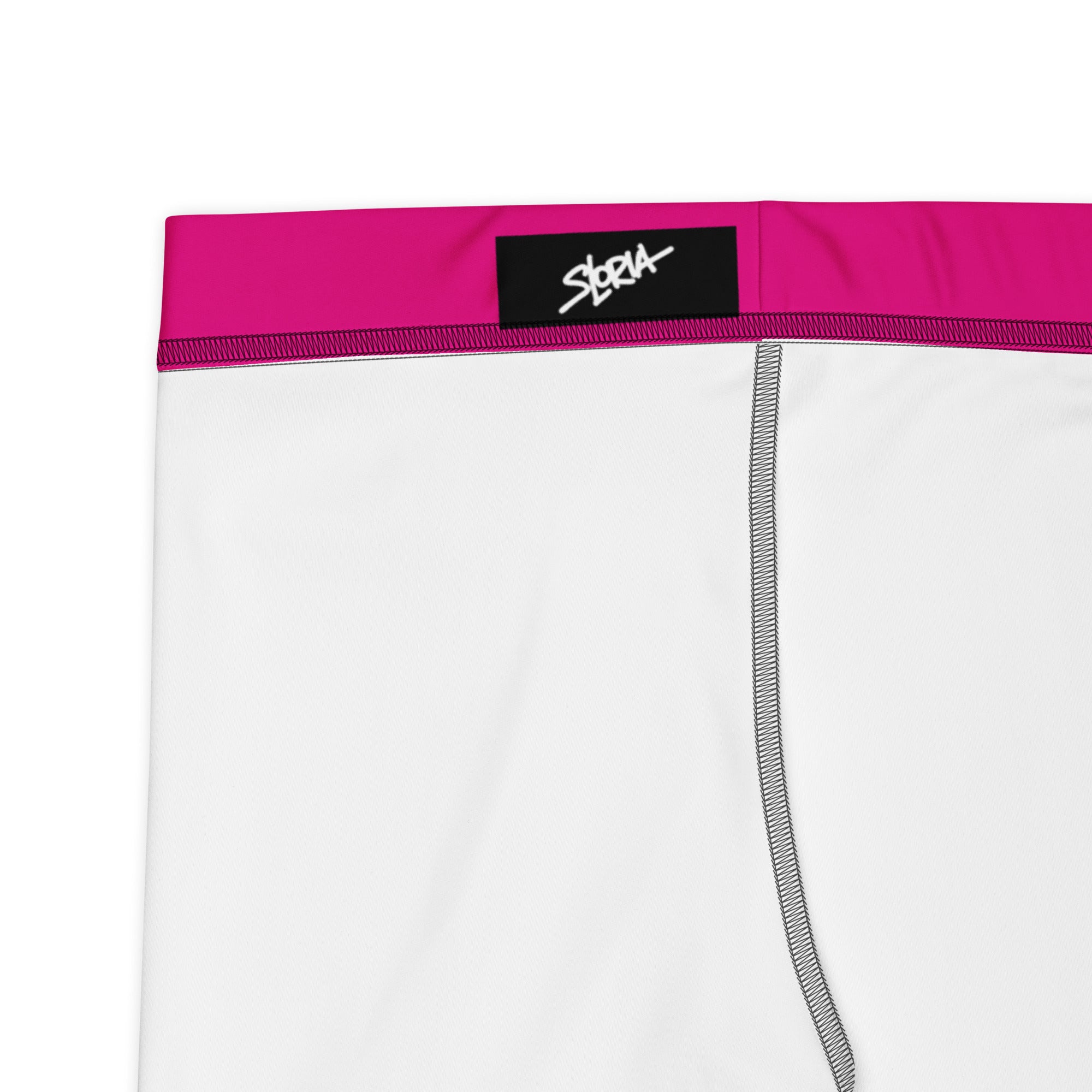 White athletic shorts with a pink waistband and black Loria NYC Art brand logo on a white background