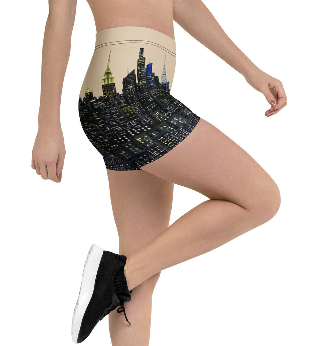 Person wearing high-waisted shorts with cityscape Loria NYC Art design on a white background