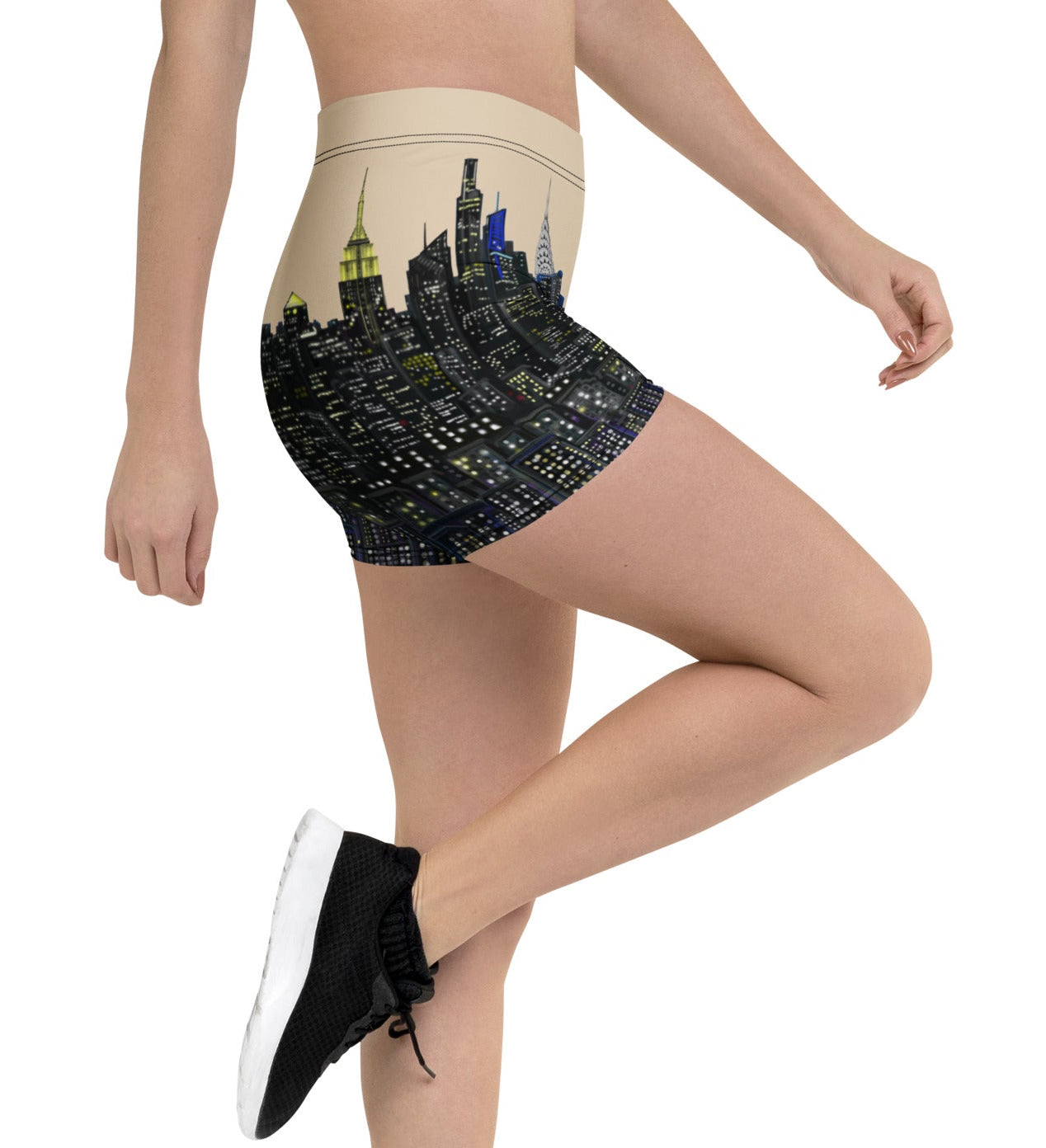 Person wearing high-waisted shorts with cityscape Loria NYC Art design on a white background