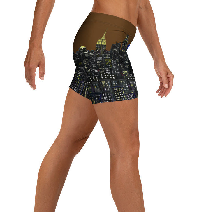 Person wearing a unique Loria NYC Art shorts on a white background