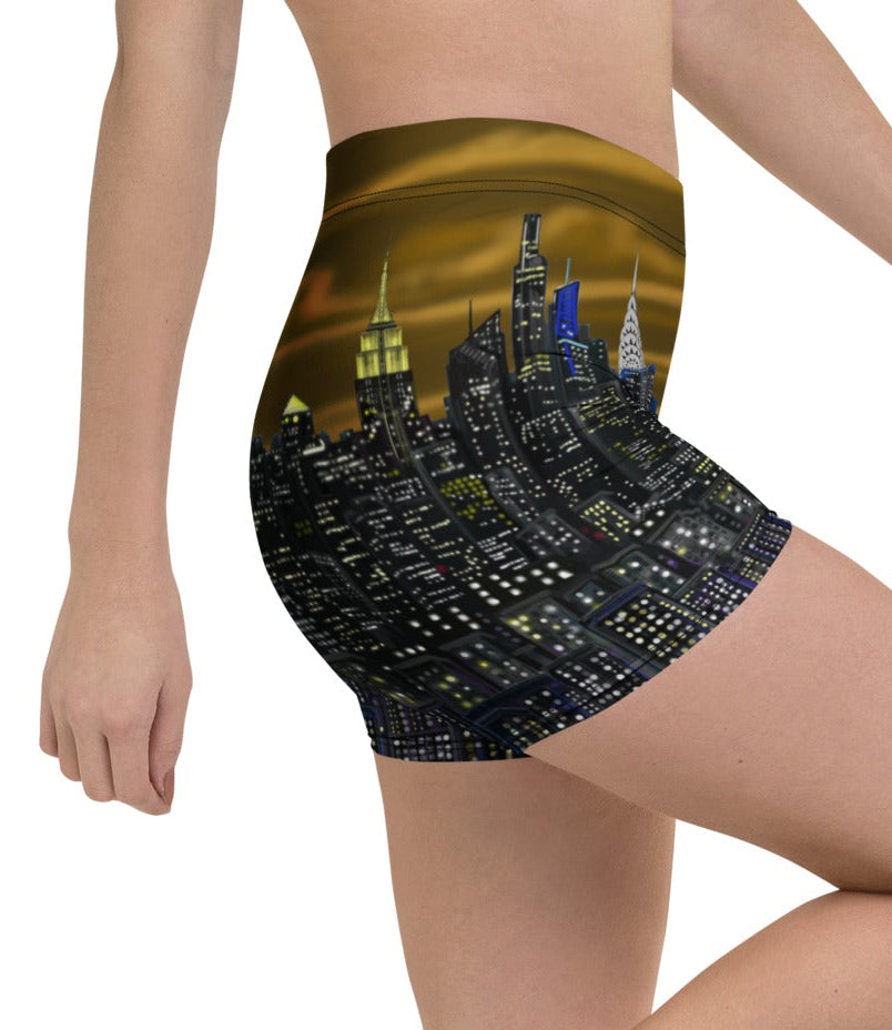 Person wearing a high-waisted Loria NYC Art shorts with a cityscape design on a white background