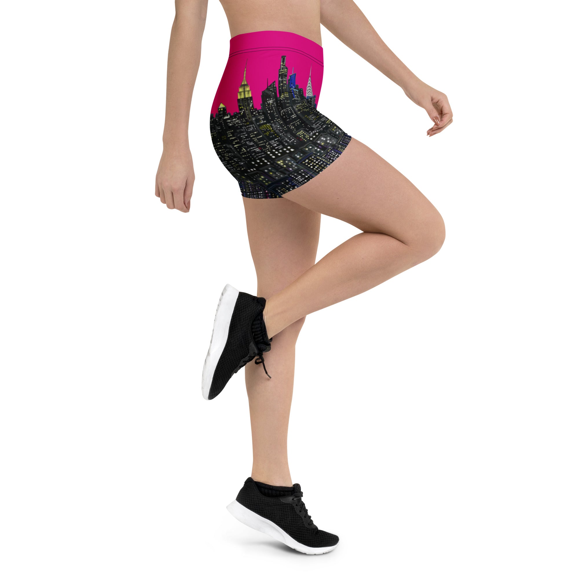 Person wearing a Loria NYC Art shorts with a cityscape design on a white background