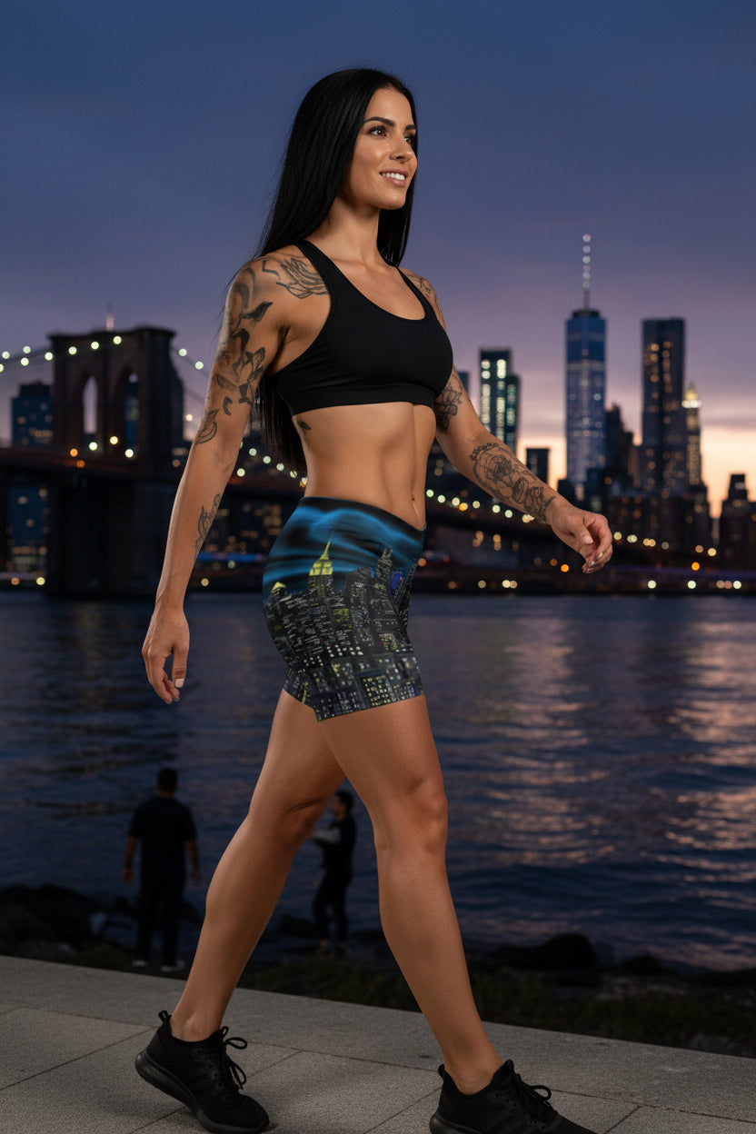 Person wearing athletic shorts with a cityscape Loria NYC Art  design on a urban background