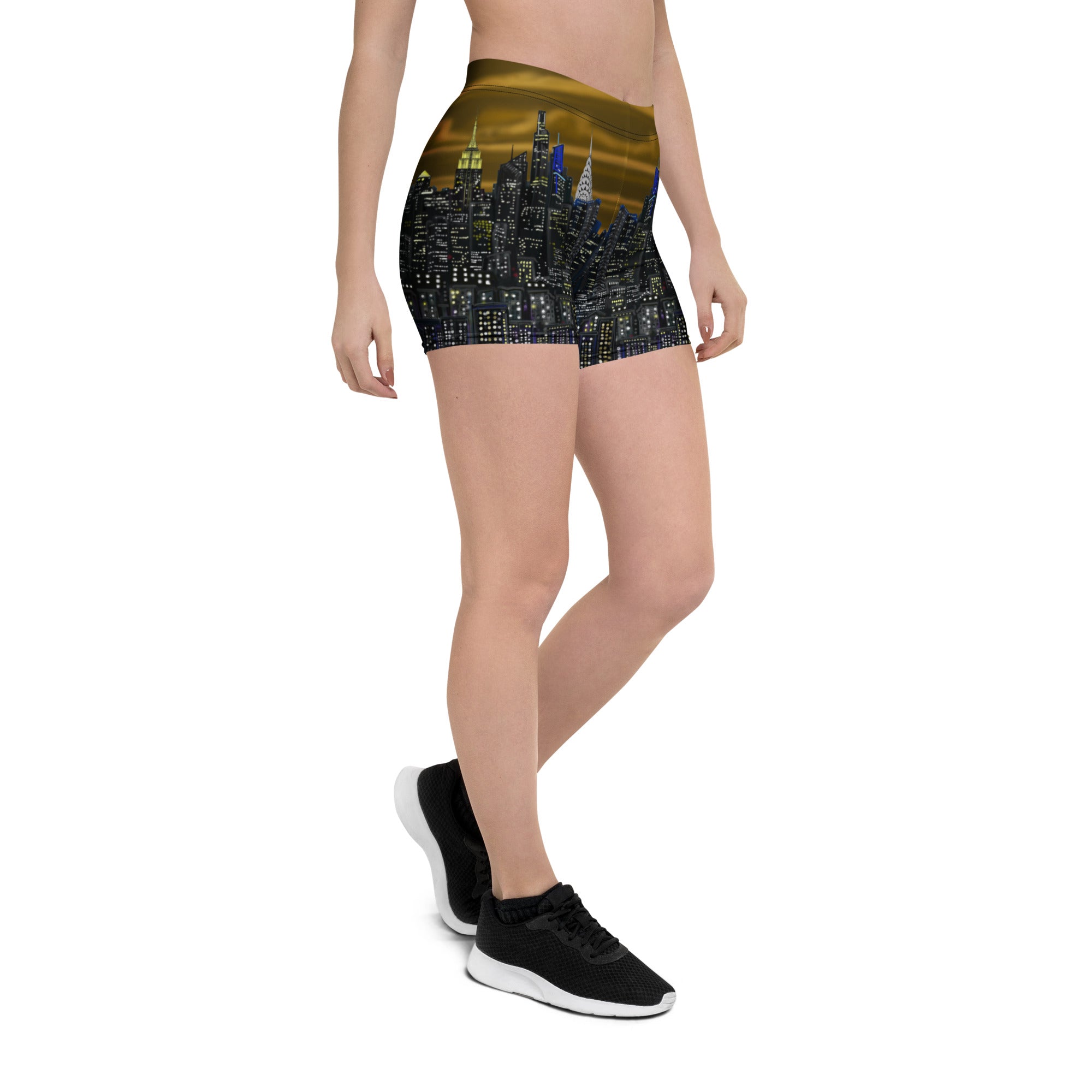 Person wearing shorts with a cityscape Loria NYC Art design on a white background