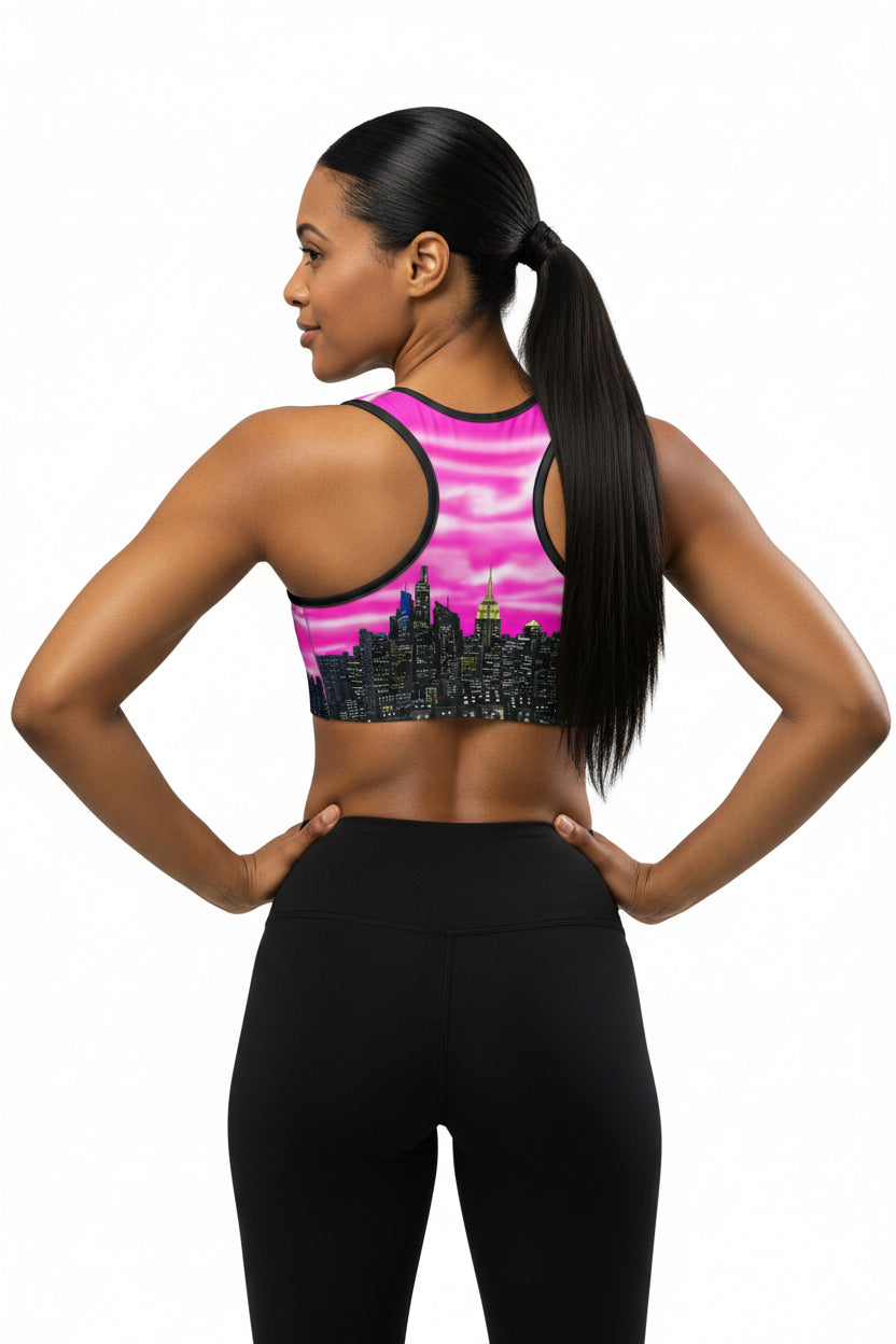 Women wearing Sports bra with cityscape design designed by Loria NYC Art on a white background