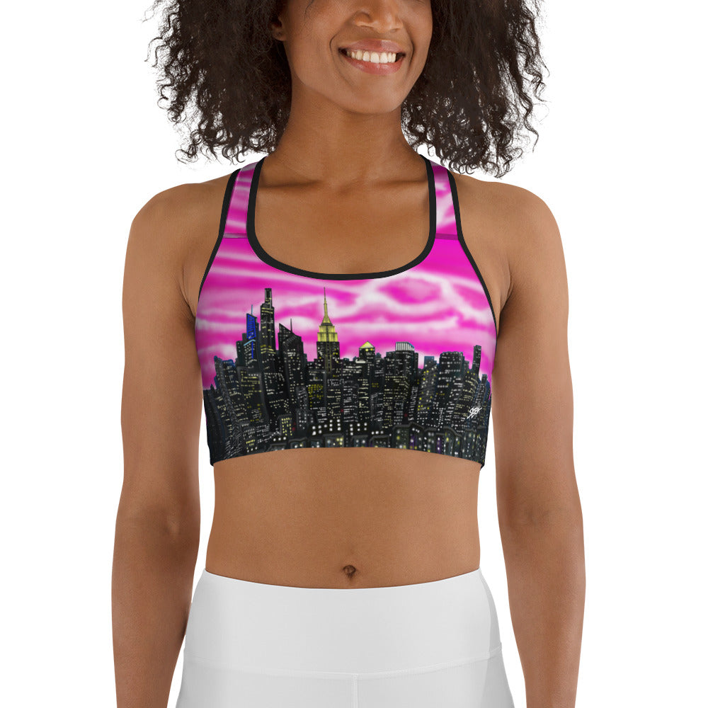 Women wearing Sports bra with cityscape design designed by Loria NYC Art on a white background