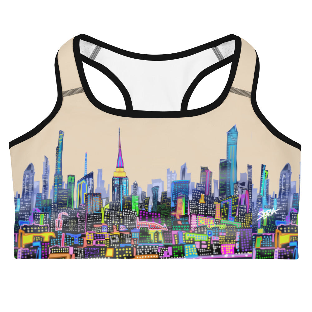 Sports bra with colorful cityscape design on a beige background designed by Loria NYC Art 