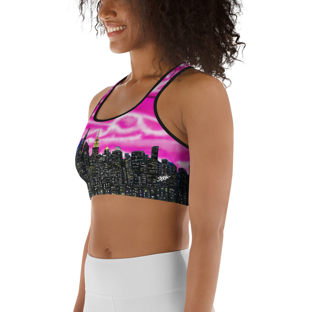 Women wearing Sports bra with cityscape design designed by Loria NYC Art on a white background