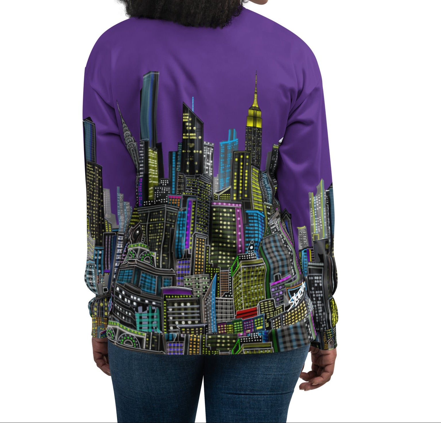Back of girl modeling a Purple jacket with a cityscape design by Loria NYC Art on a white background