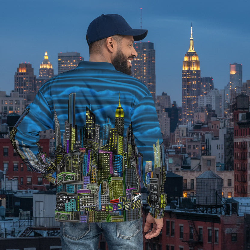 Man wearing a shirt with a cityscape designed by Loria NYC Art on a skyline background