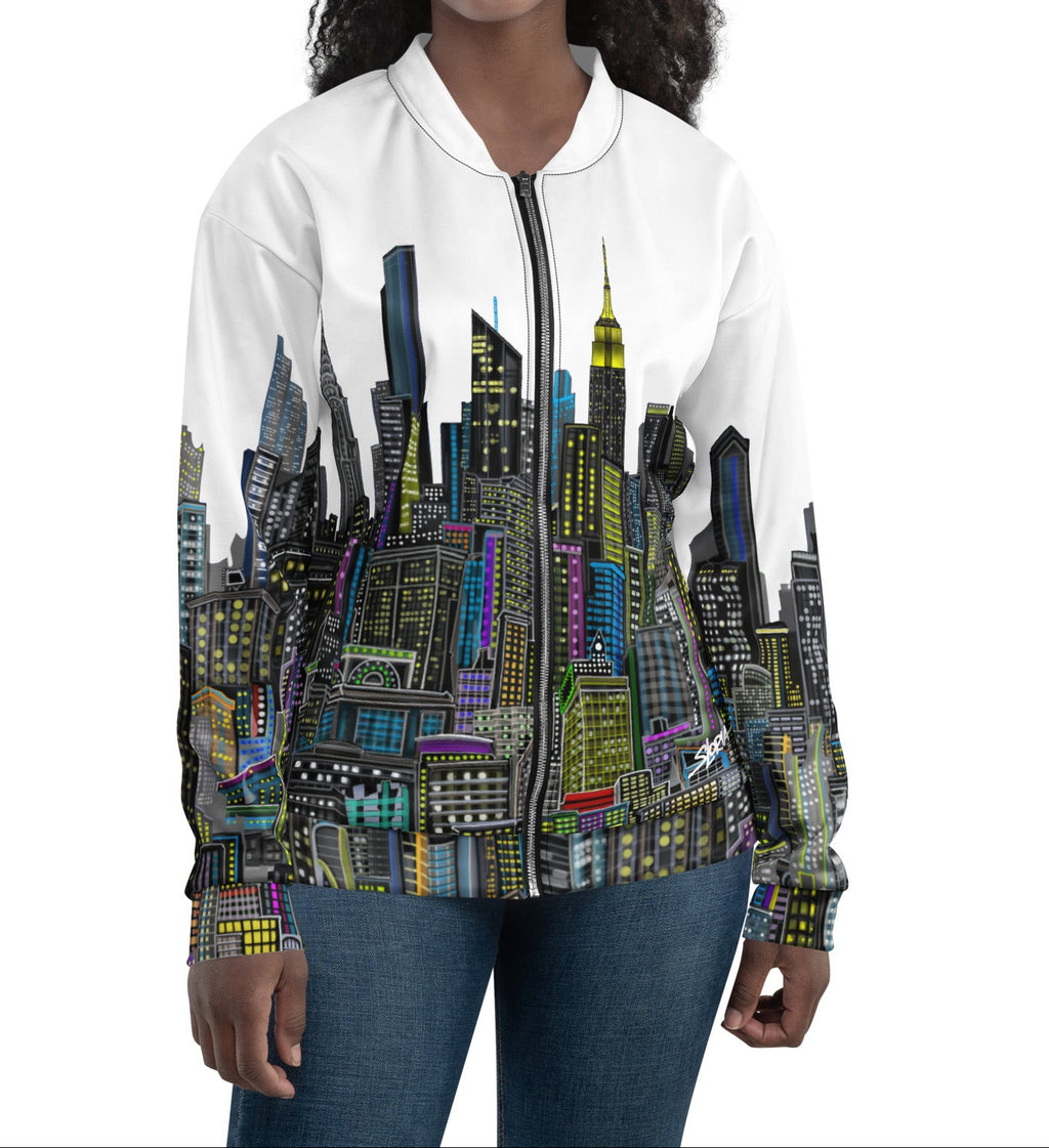 Front view of women wearing a White bomber jacket with a colorful cityscape designed by Loria NYC Art 