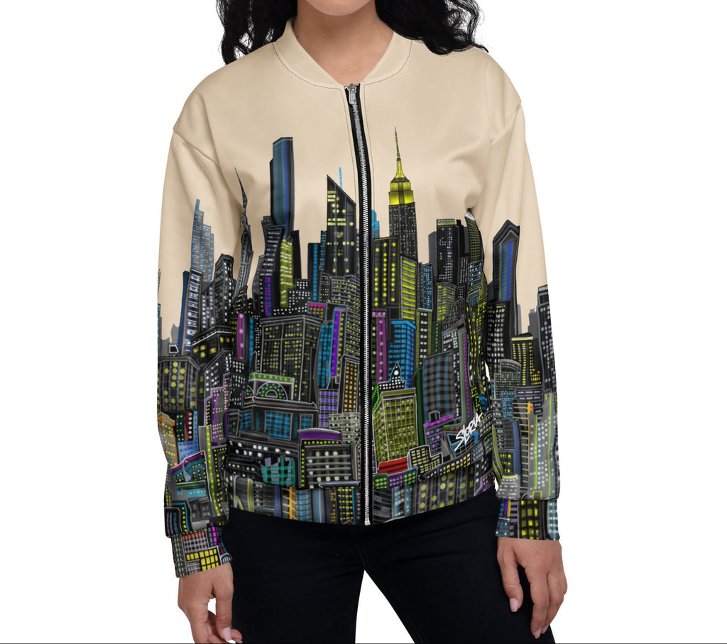 Woman wearing a bomber jacket with a cityscape Loria NYC Art design on a white background