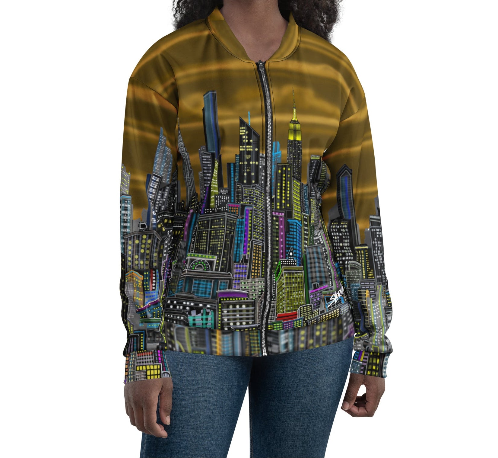 Woman wearing a gold shirt with a cityscape design by Loria NYC Art on the back, on a white background