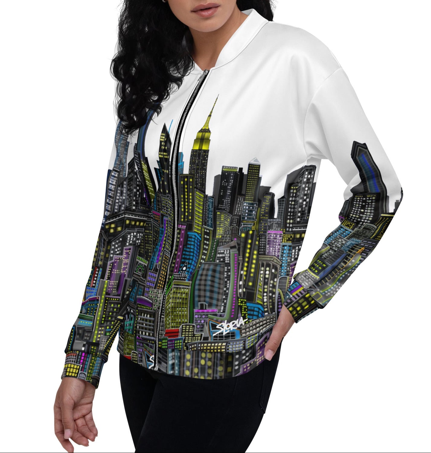 Side of women wearing a White bomber jacket with a colorful cityscape designed by Loria NYC Art 