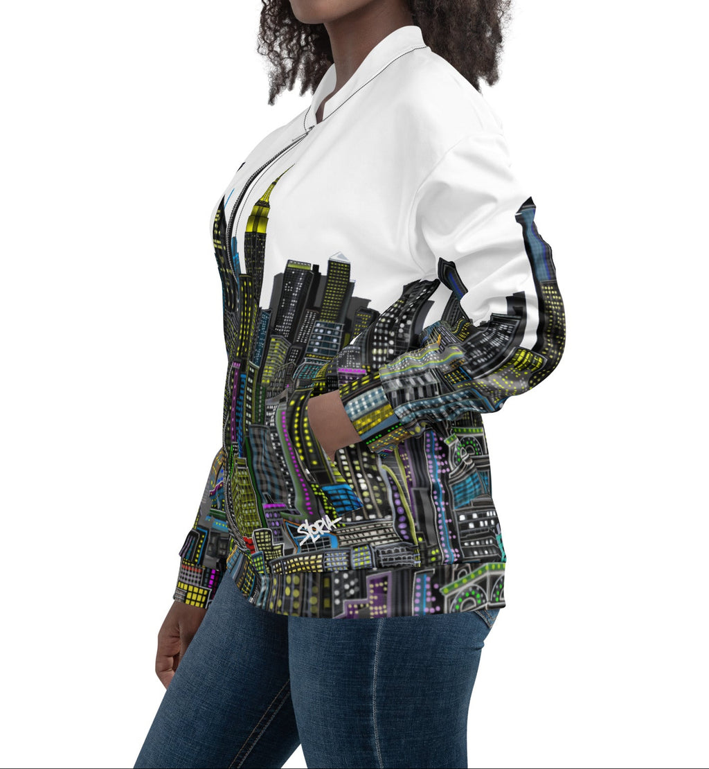 Women posing in  a White bomber jacket with a colorful cityscape designed by Loria NYC Art 