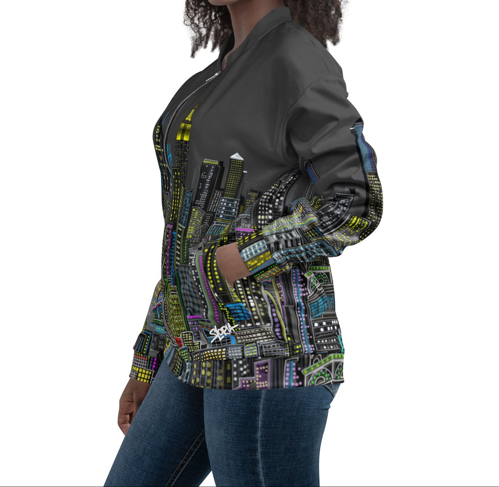 Side view of a View Woman wearing a grey colorful cityscape jacket by Loria NYC Art on a white background