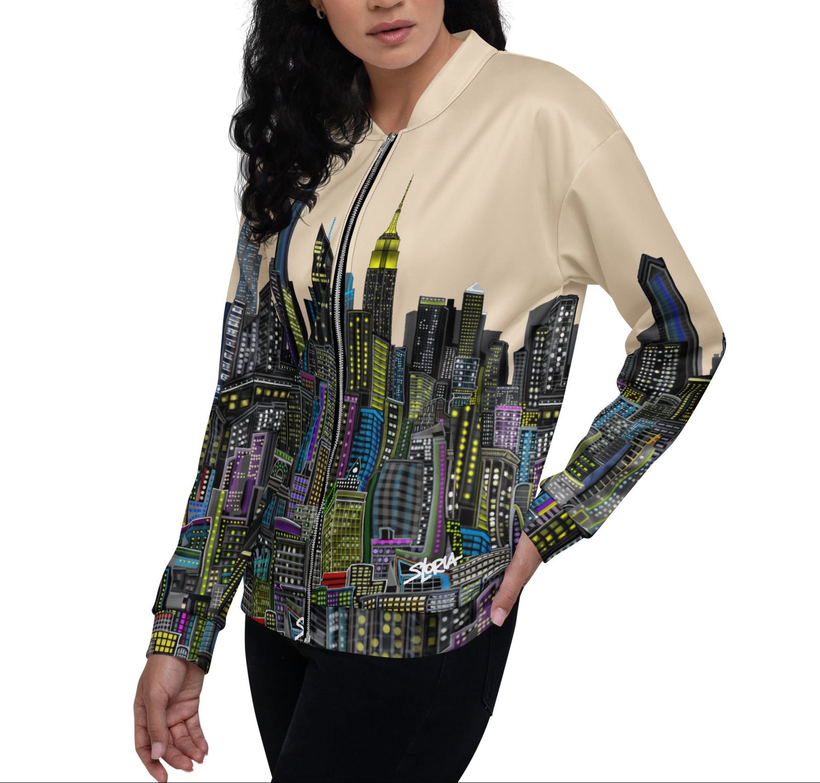 Posing Woman wearing a long-sleeve shirt with a cityscape Loria NYC Art pattern on a white background