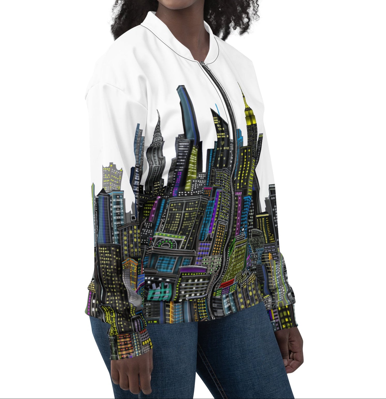Side view of women wearing a White bomber jacket with a colorful cityscape designed by Loria NYC Art 