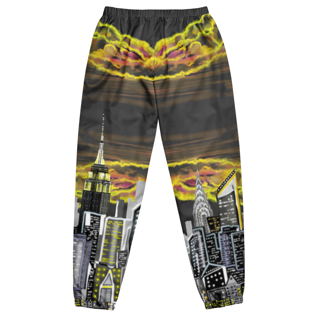 Pants with cityscape Loria NYC Art design featuring iconic buildings against a sunset sky.